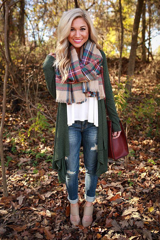 woman wearing cozy cardigan sweater in autumn