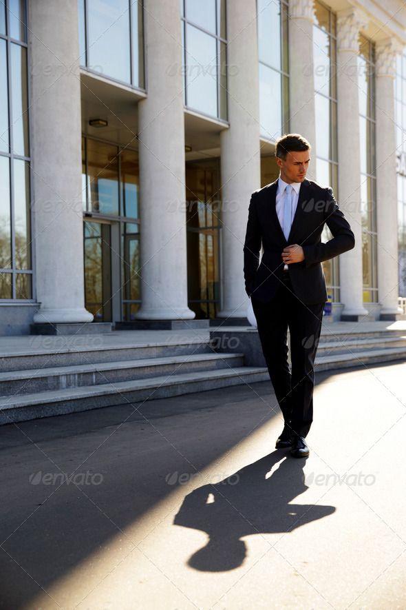 person confidently walking down the street in their stylish outfit