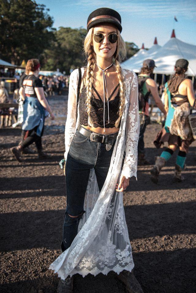 woman wearing a skirt and blouse at a summer festival