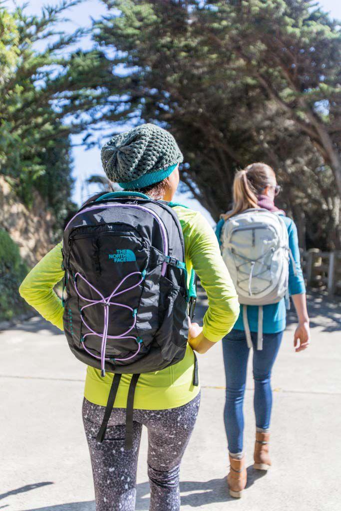 woman hiking with North Face Borealis backpack