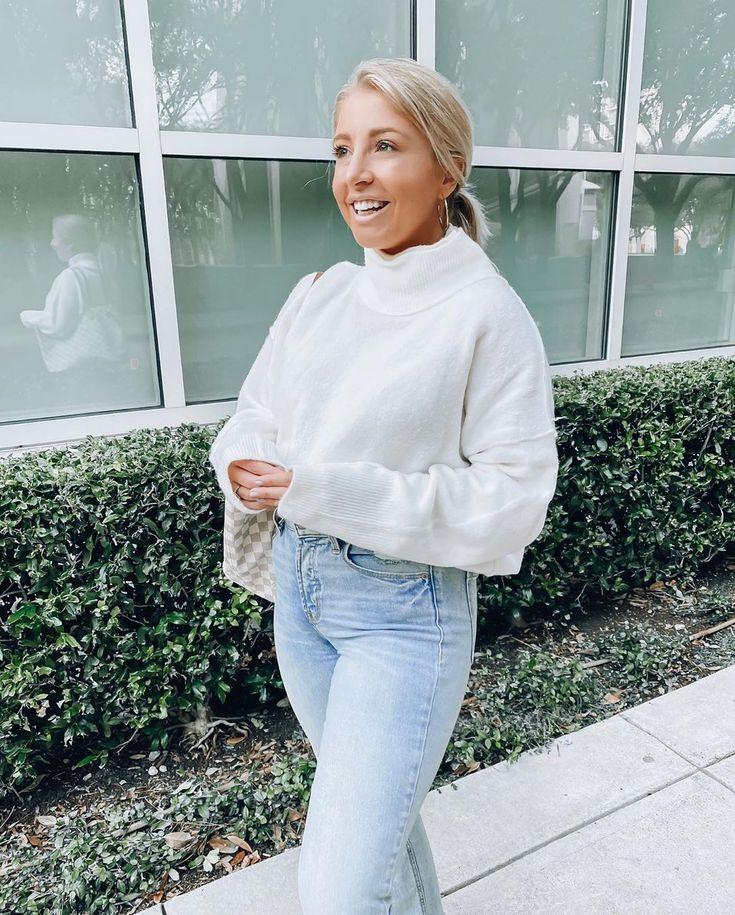 woman wearing turtleneck sweater with simple stud earrings