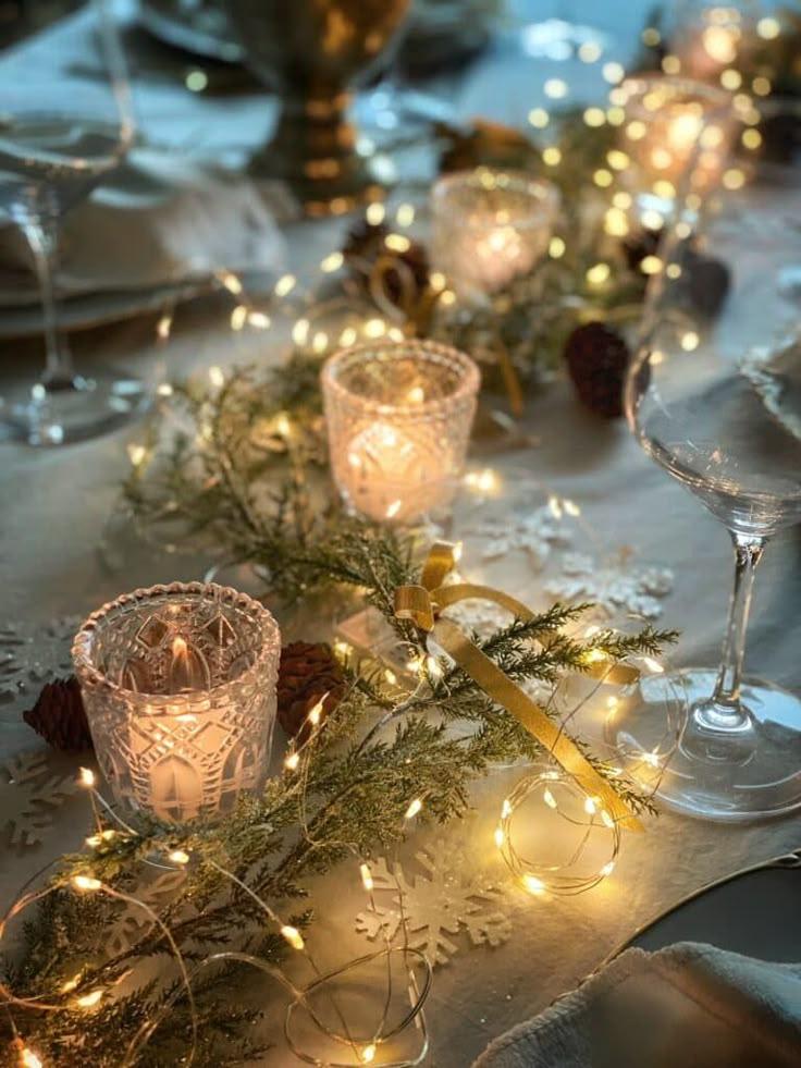 fairy lights draped around furniture, elegant candles on a table