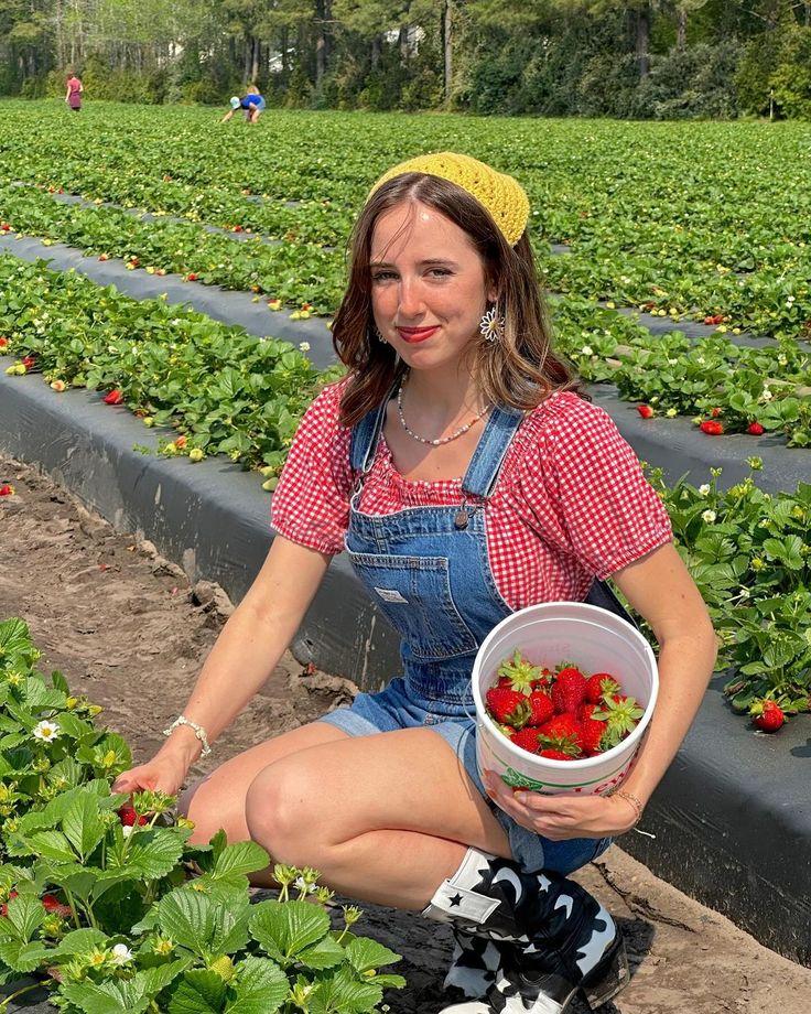 woman in a comfortable outfit at a strawberry festival