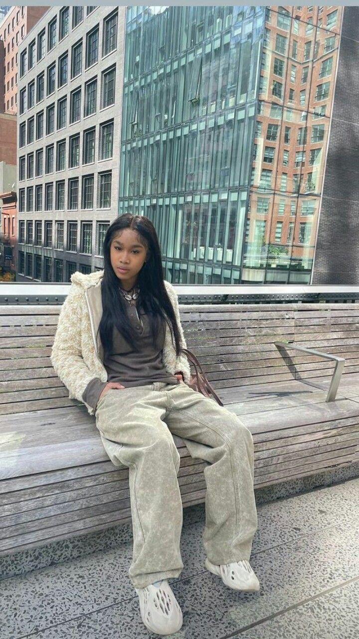teen girl wearing oversized clothing