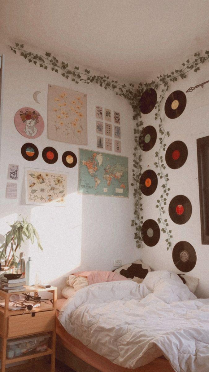dorm room decorated with vintage aesthetic posters