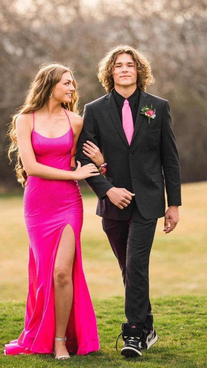 couple posing casually at prom