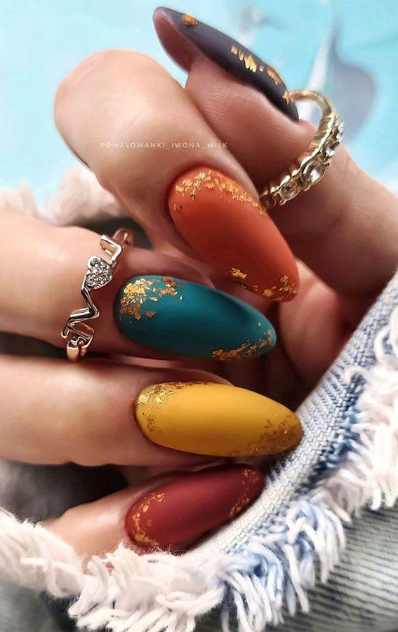 Autumn nail art designs with jewel tones