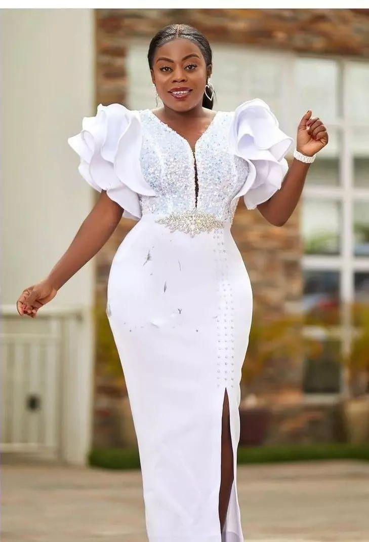 woman in a lace graduation dress