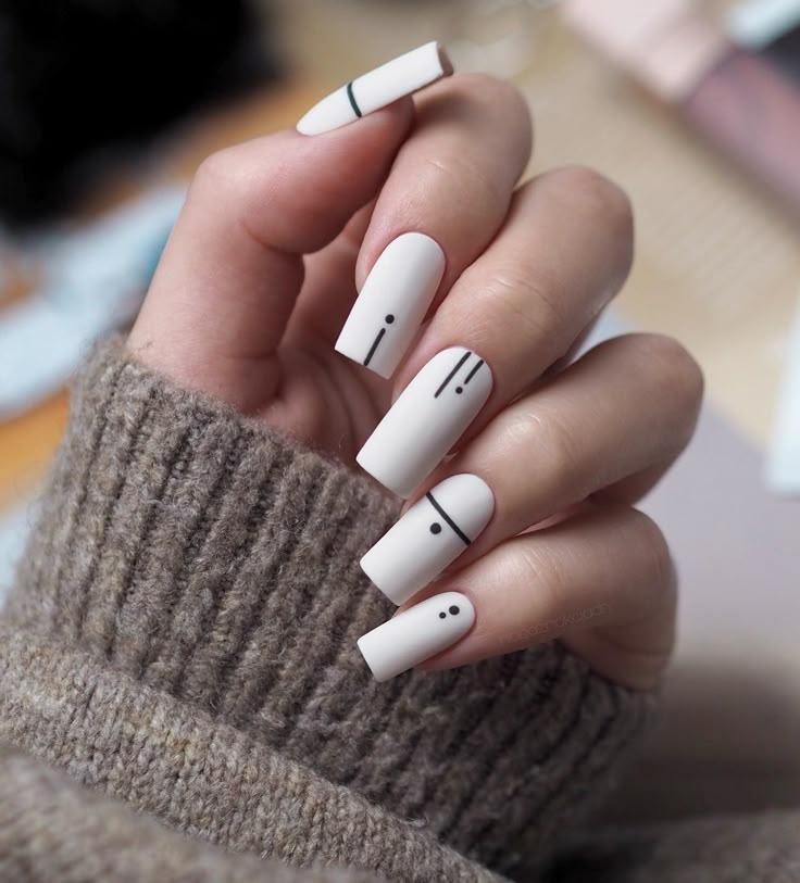 White Nails with Geometric Lines