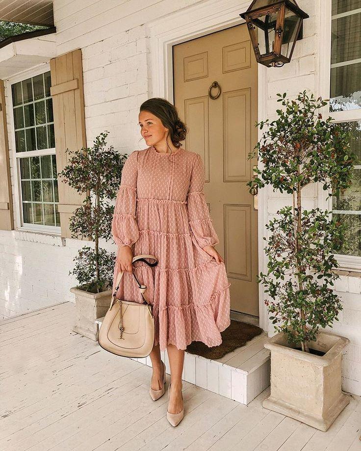 Woman smiling in a stylish, modest summer outfit