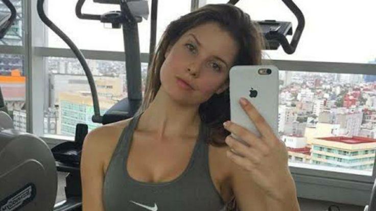 woman setting fitness goals on her phone