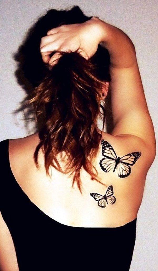woman getting a butterfly tattoo