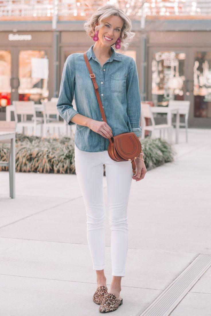 woman wearing casual outfit with small, elegant earrings
