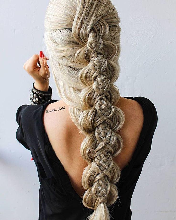 woman with a complex braided hairstyle