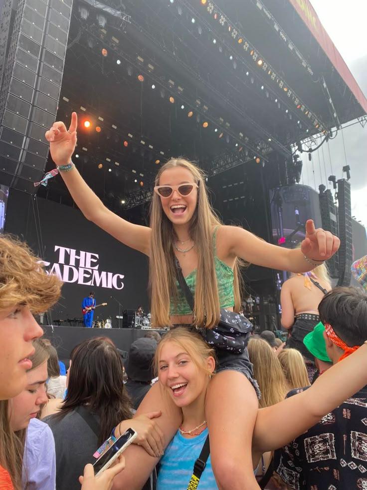 woman smiling at coachella with friends