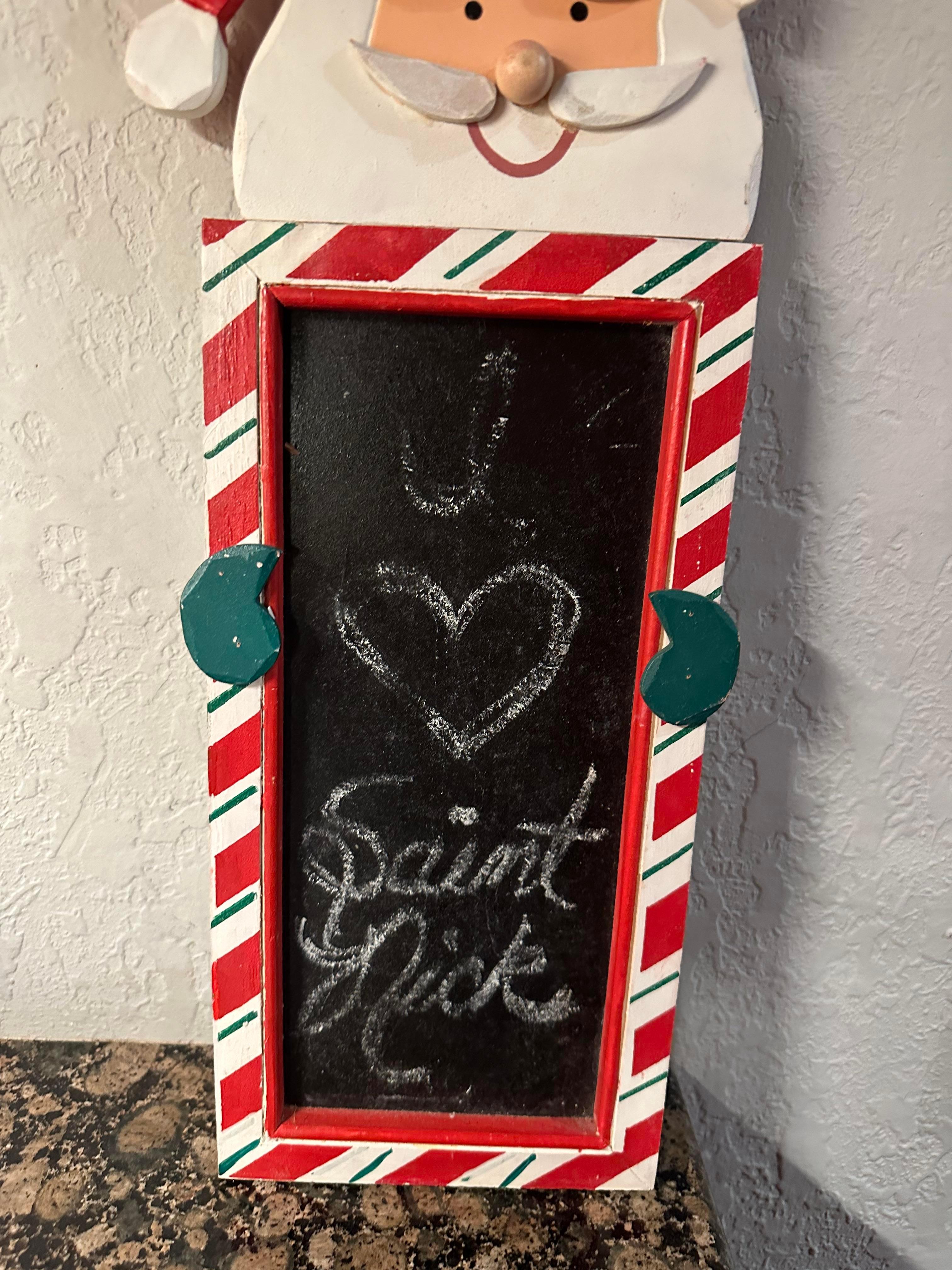 applying fixative to chalkboard art