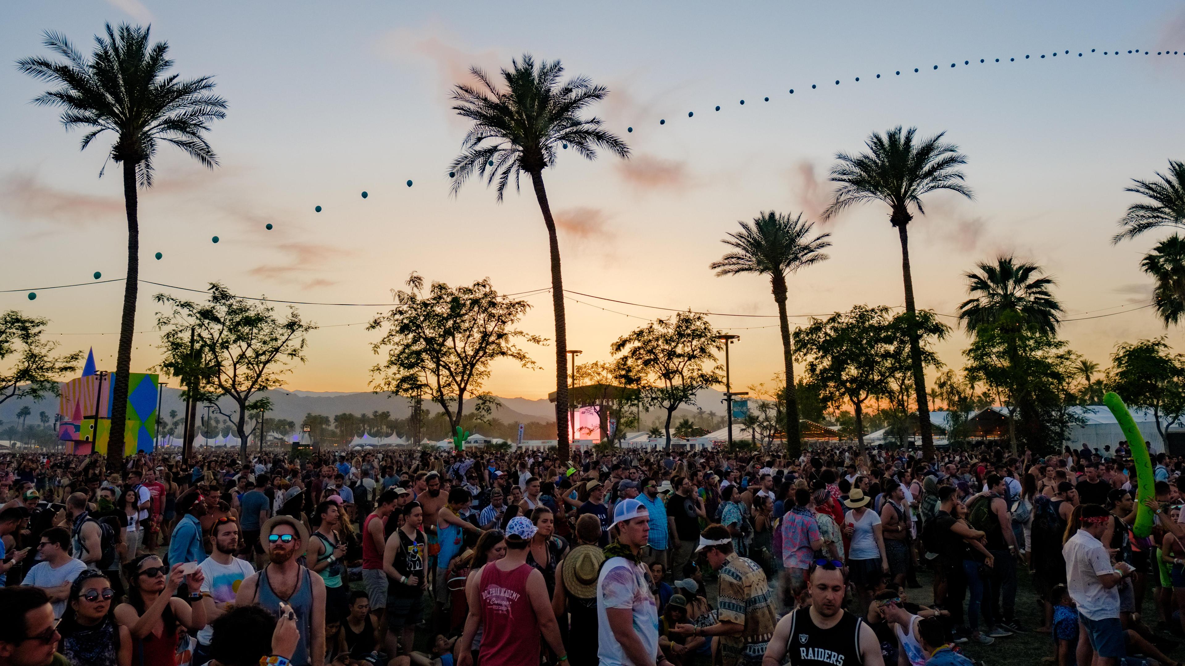 crowd enjoying music at Coachella at sunset