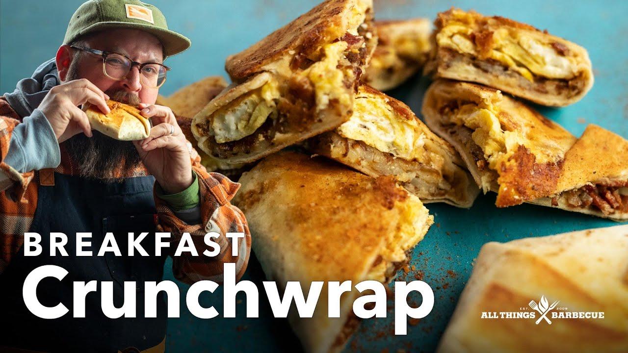 person enjoying a breakfast crunchwrap with coffee