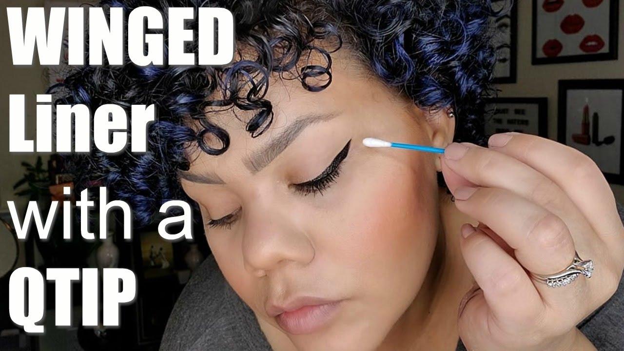 cleaning up eyeliner with q-tip