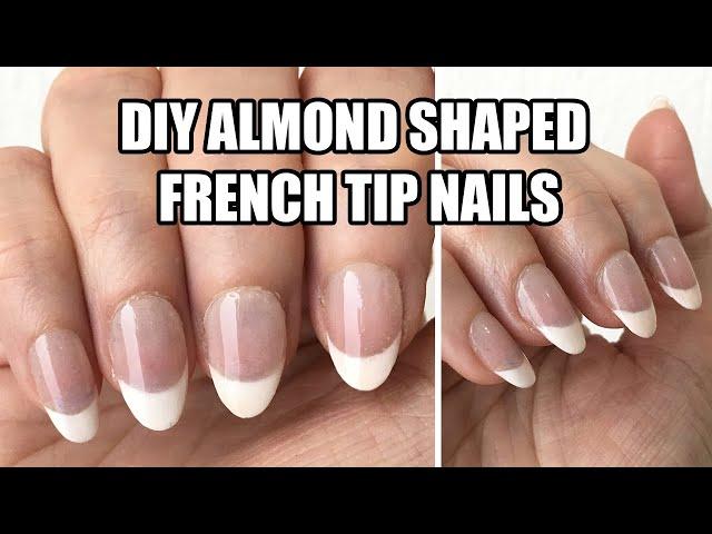 woman carefully filing her nails into an almond shape at home, DIY manicure