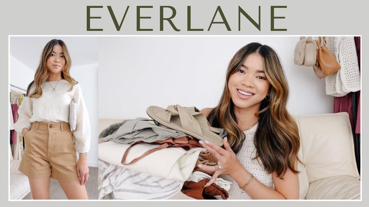 woman trying on clothes from Everlane