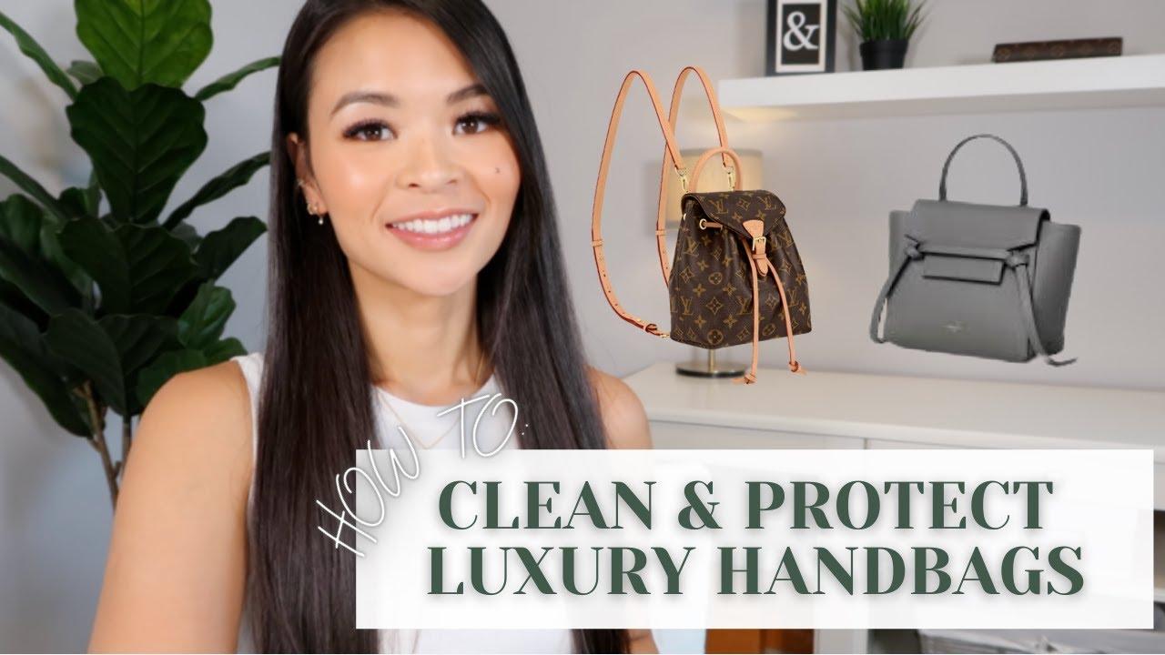 woman applying leather conditioner to her designer handbag