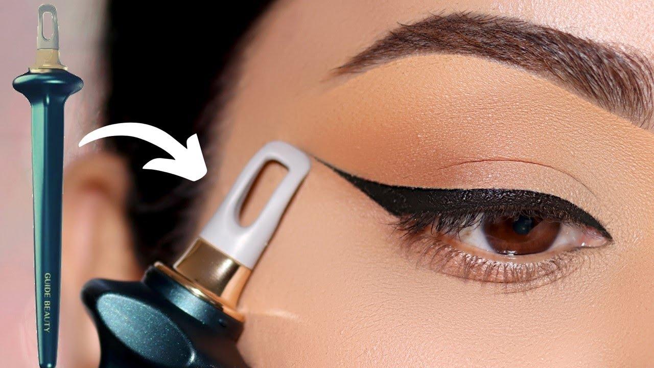 woman applying winged eyeliner with a steady hand