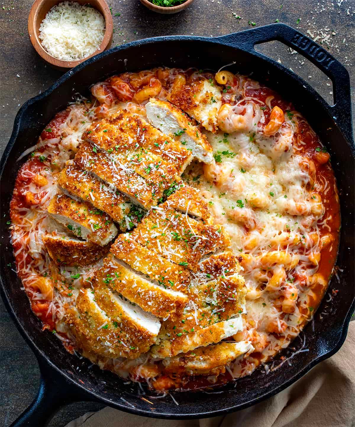 crispy parmesan chicken cutlets served with pasta and marinara sauce