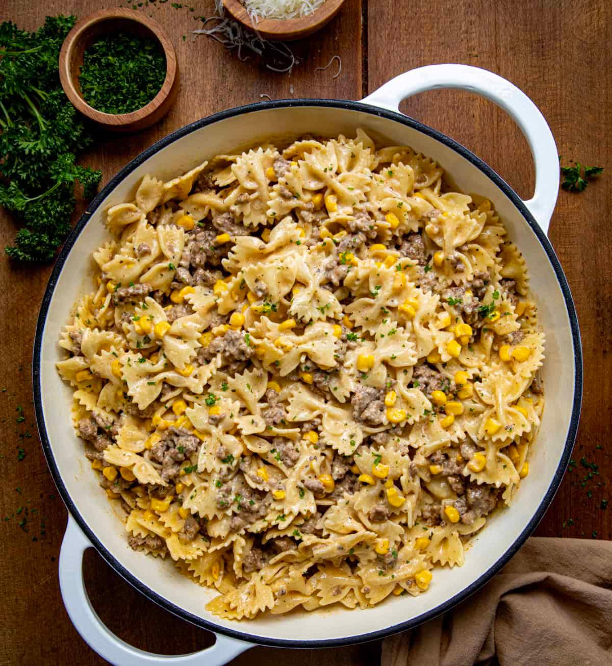 close up shot of ranch beef pasta in a bowl with a creamy sauce and beef crumbles