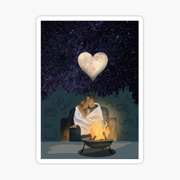 couple snuggling by a fireplace, looking at stars