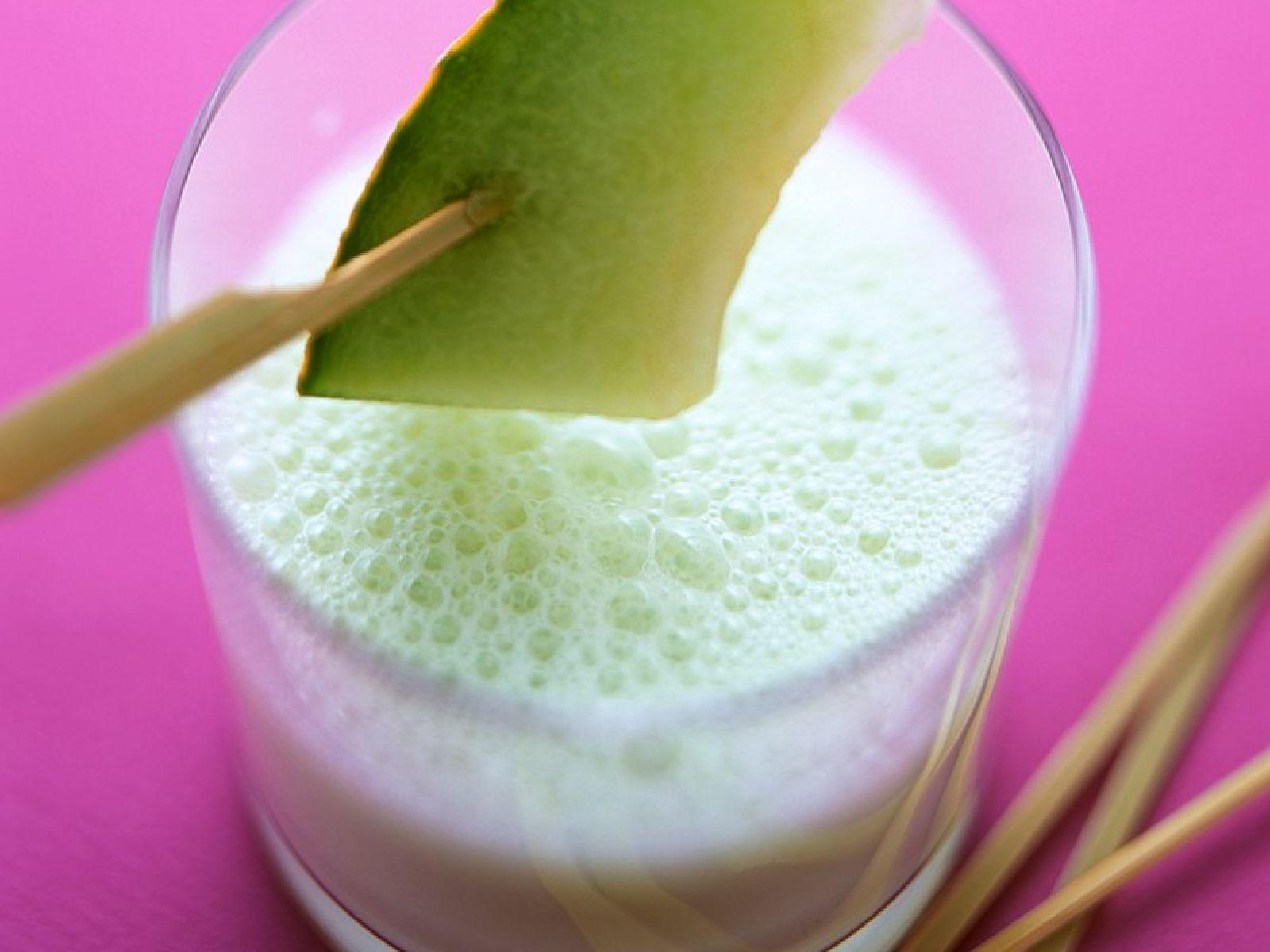 a glass of dandelion honey dew lassi