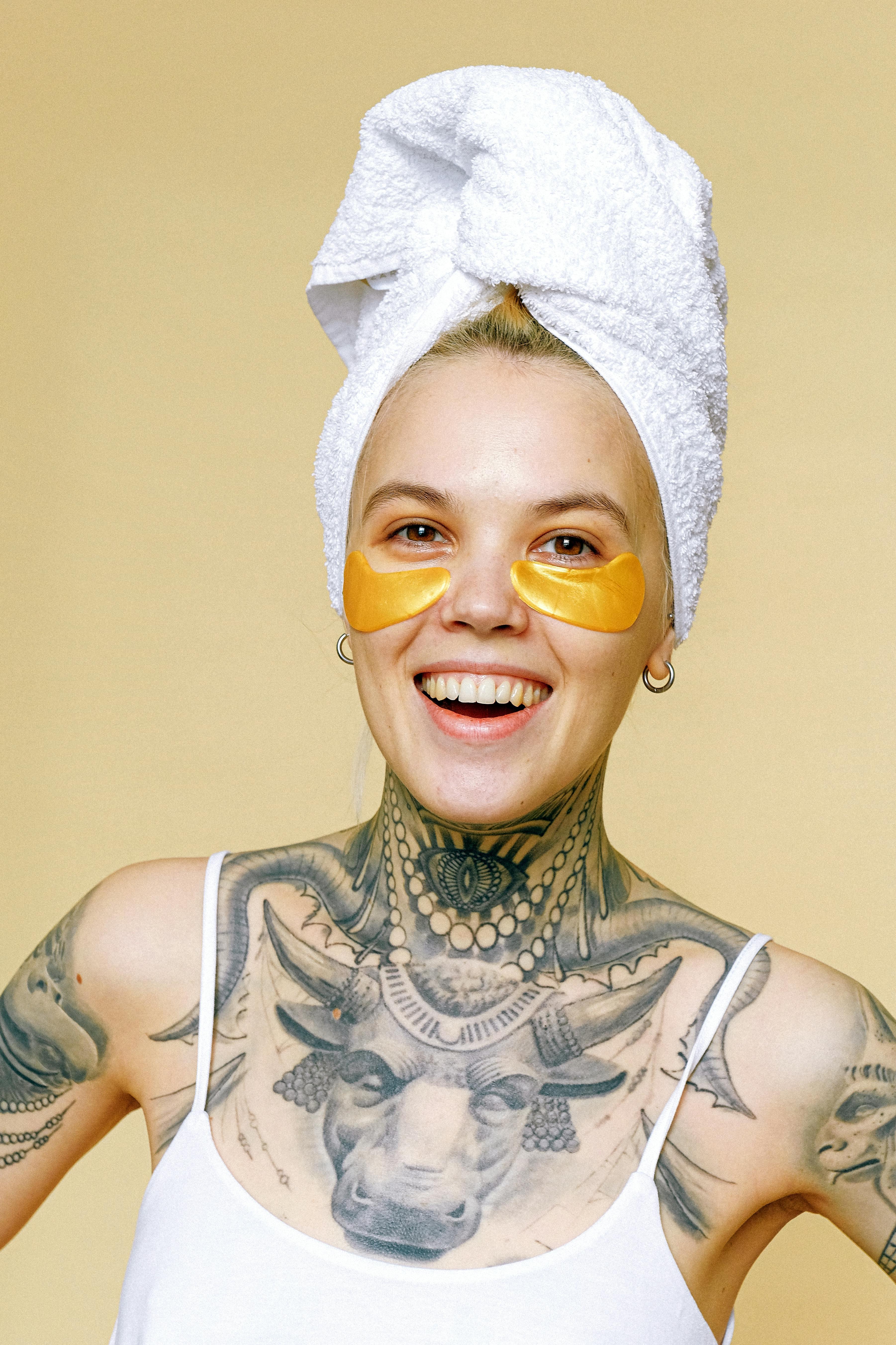 happy woman with new tattoo