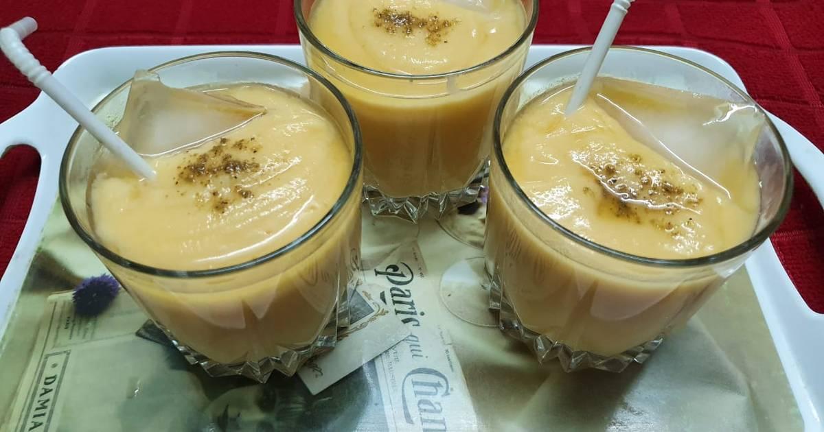 ingredients for walnut apple lassi on a wooden table