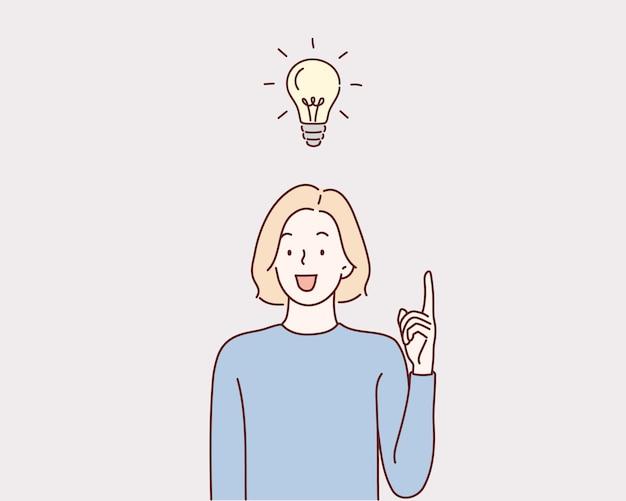 lightbulb turning on above a woman's head