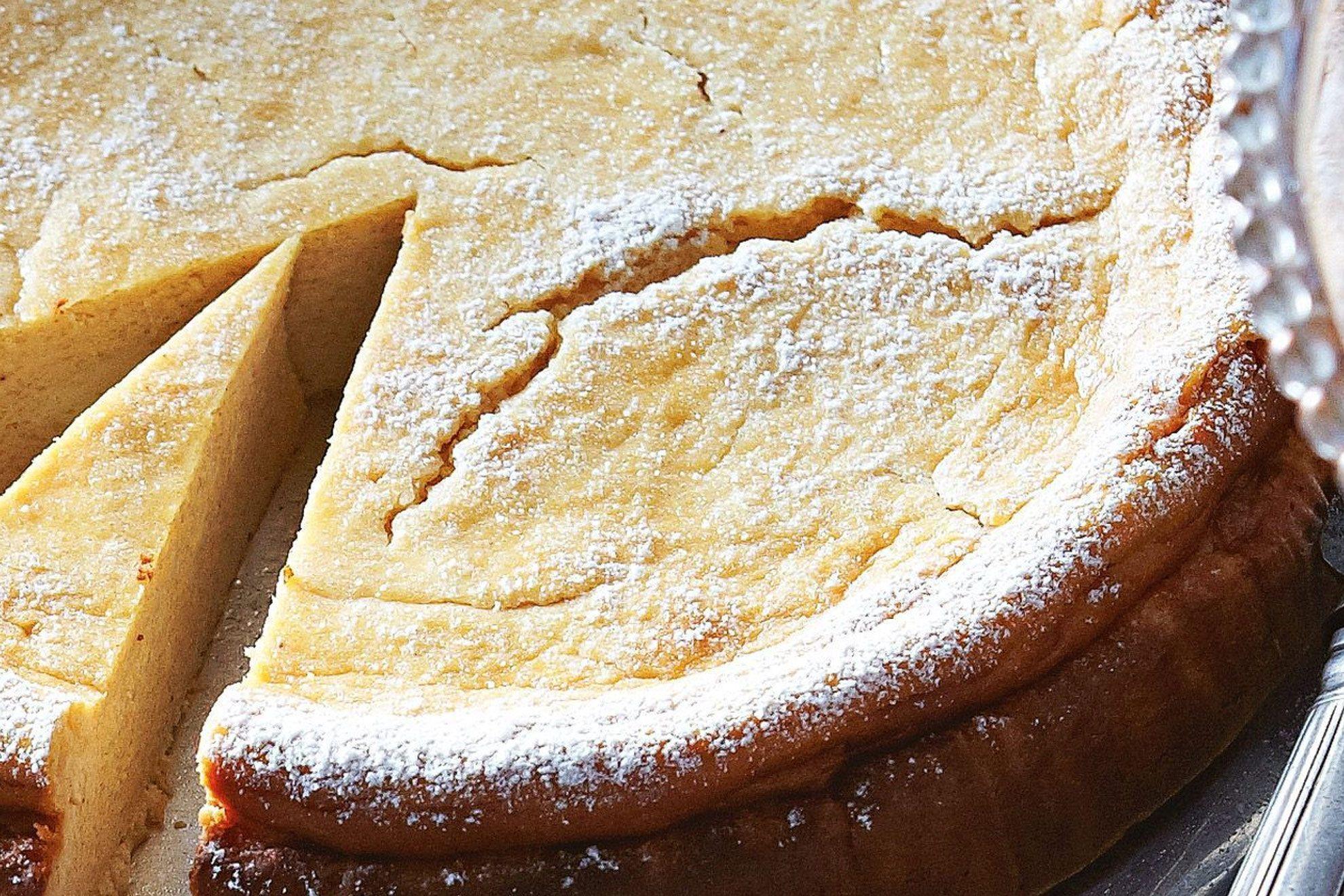Cracked homemade cheesecake, baking fail, close-up