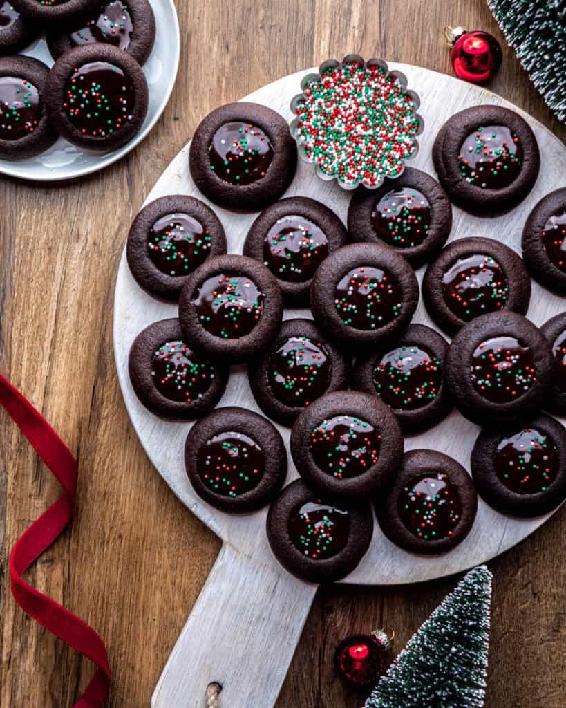 Ingredients for chocolate thumbprint cookies laid out on a kitchen counter