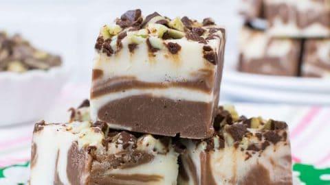 various mint chocolate square dessert ideas, some with chocolate shavings, some with white chocolate swirls