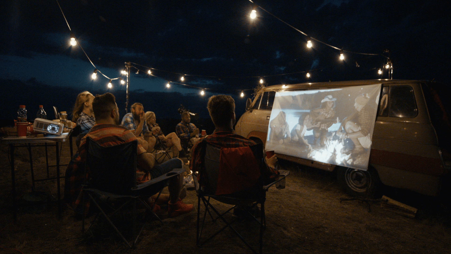 friends gathered for an outdoor movie night
