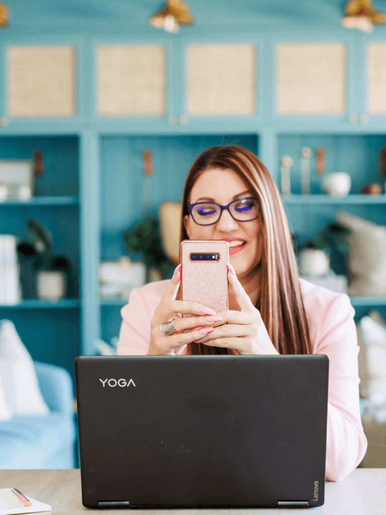Woman looking at Instagram analytics on her laptop