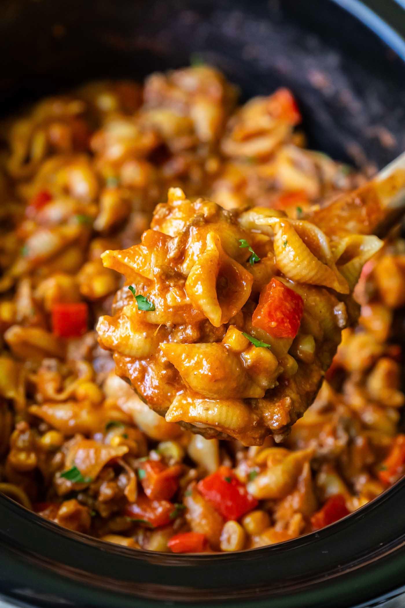a delicious looking crockpot meal being served