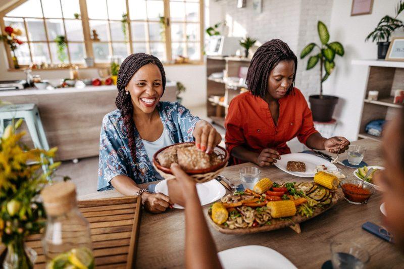 people eating a healthy and balanced meal before a party