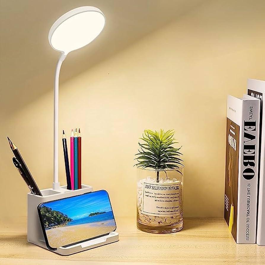 dorm desk with a modern desk lamp providing focused lighting