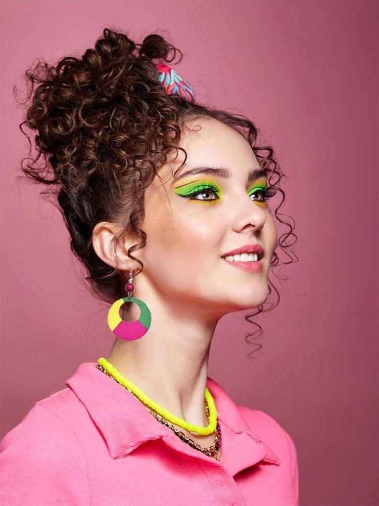woman wearing bright colorful acrylic earrings