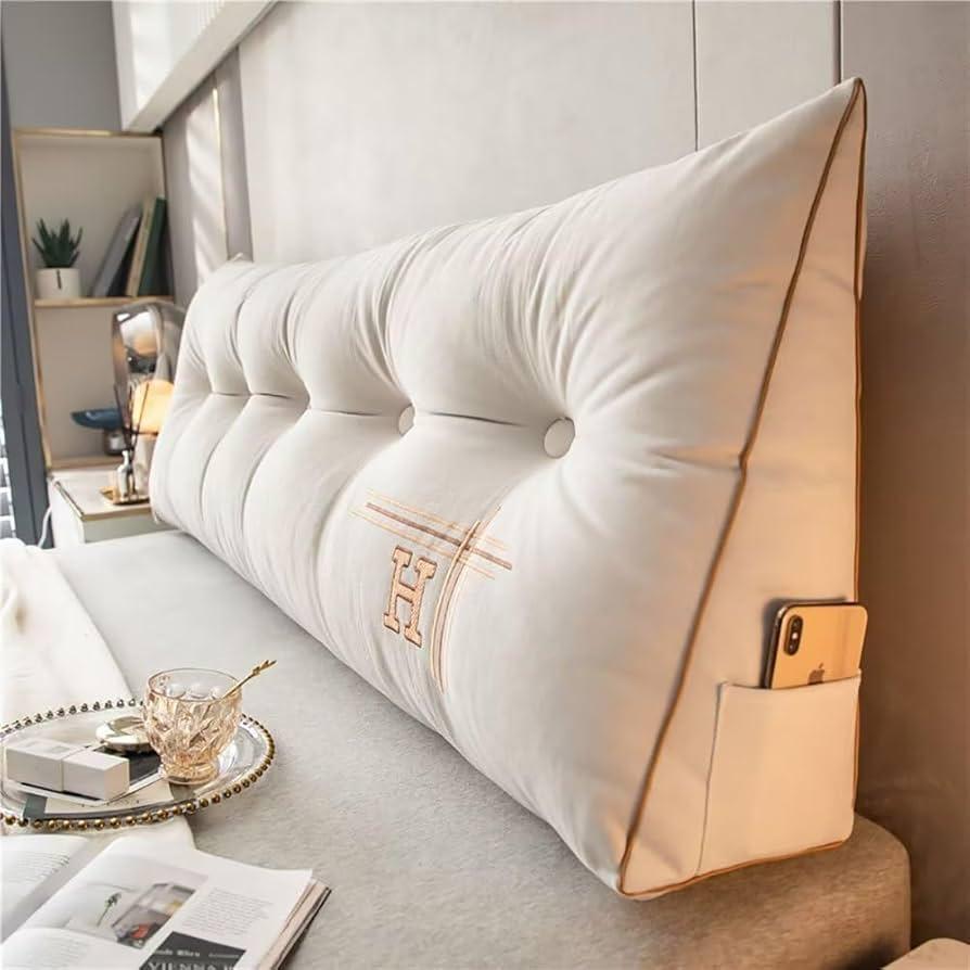 Bolster pillows used in different ways in a dorm room