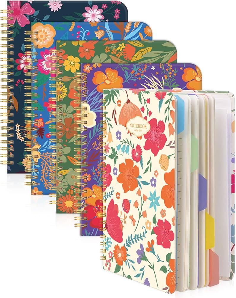 five cute notebooks displayed together