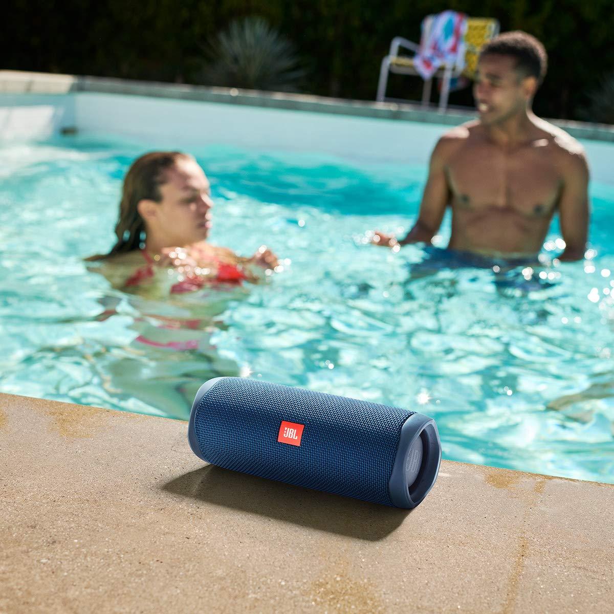 JBL Flip Bluetooth speaker by the pool