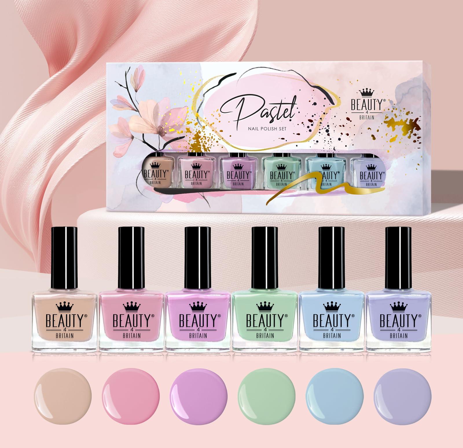 three pastel nail polish kits arranged for display