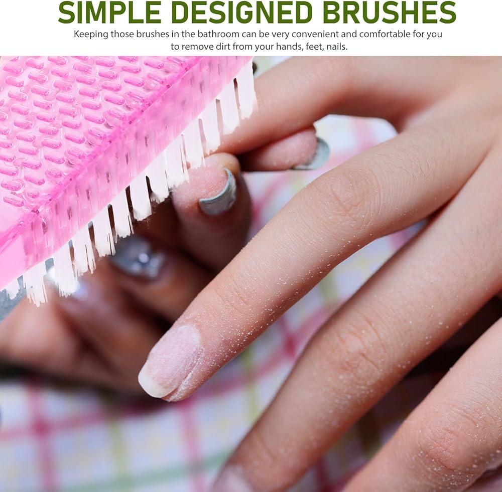 close up of various pink nail brushes