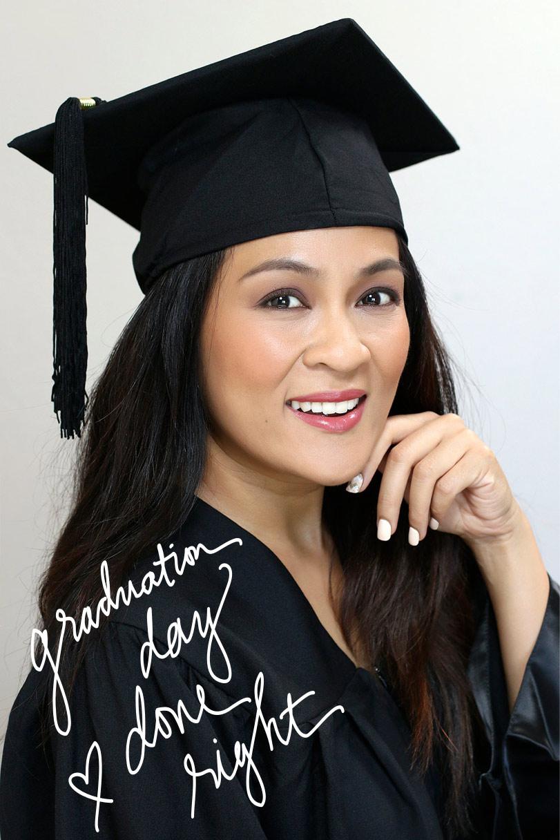 Woman smiling with graduation cap and perfectly manicured nails