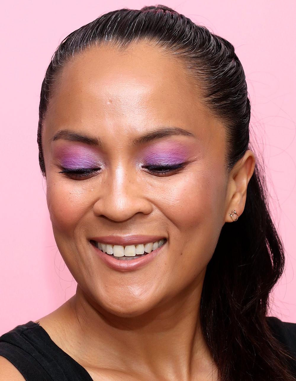 woman wearing bright colorful eyeshadow